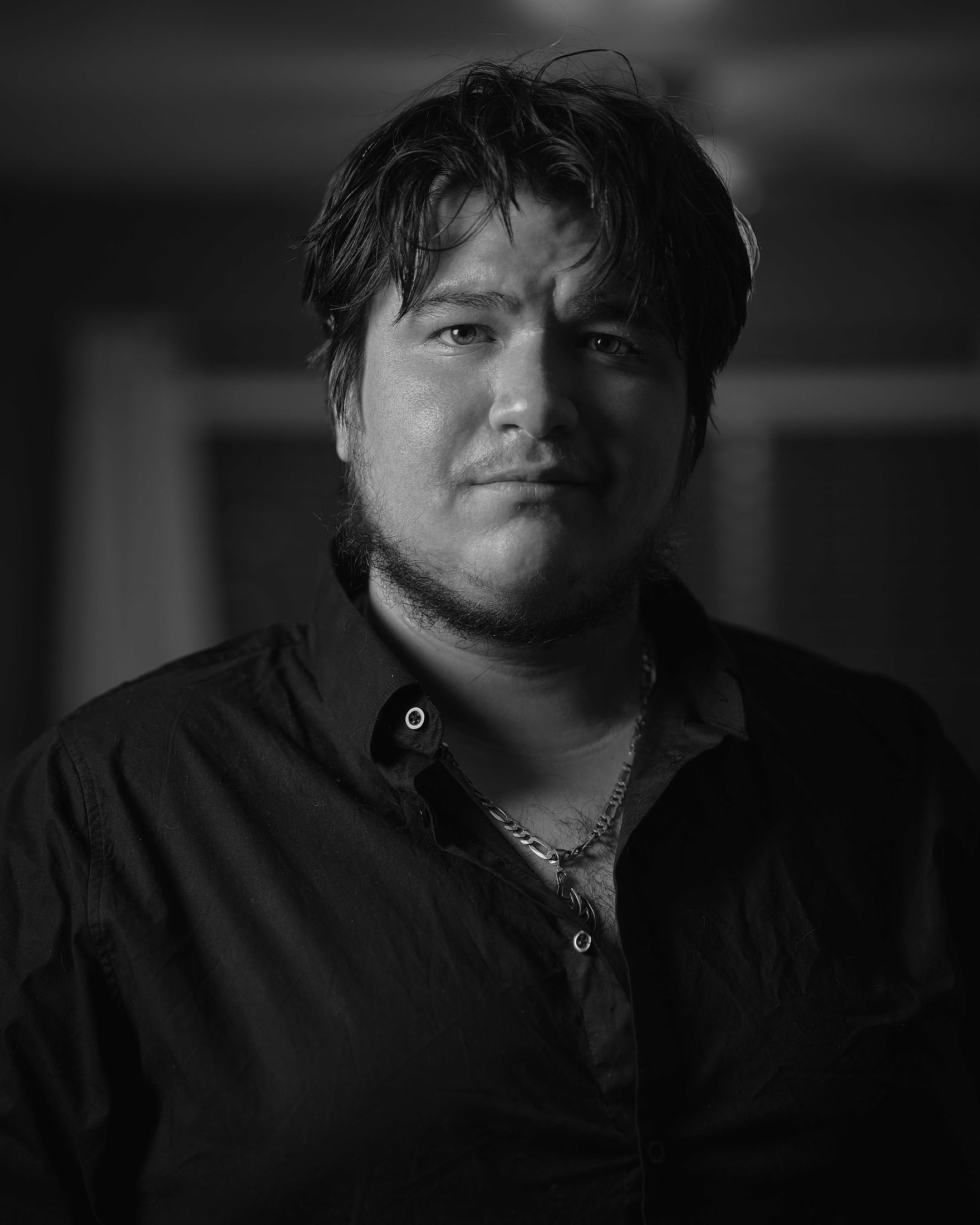 Steven Recinos, photographer, black and white portrait