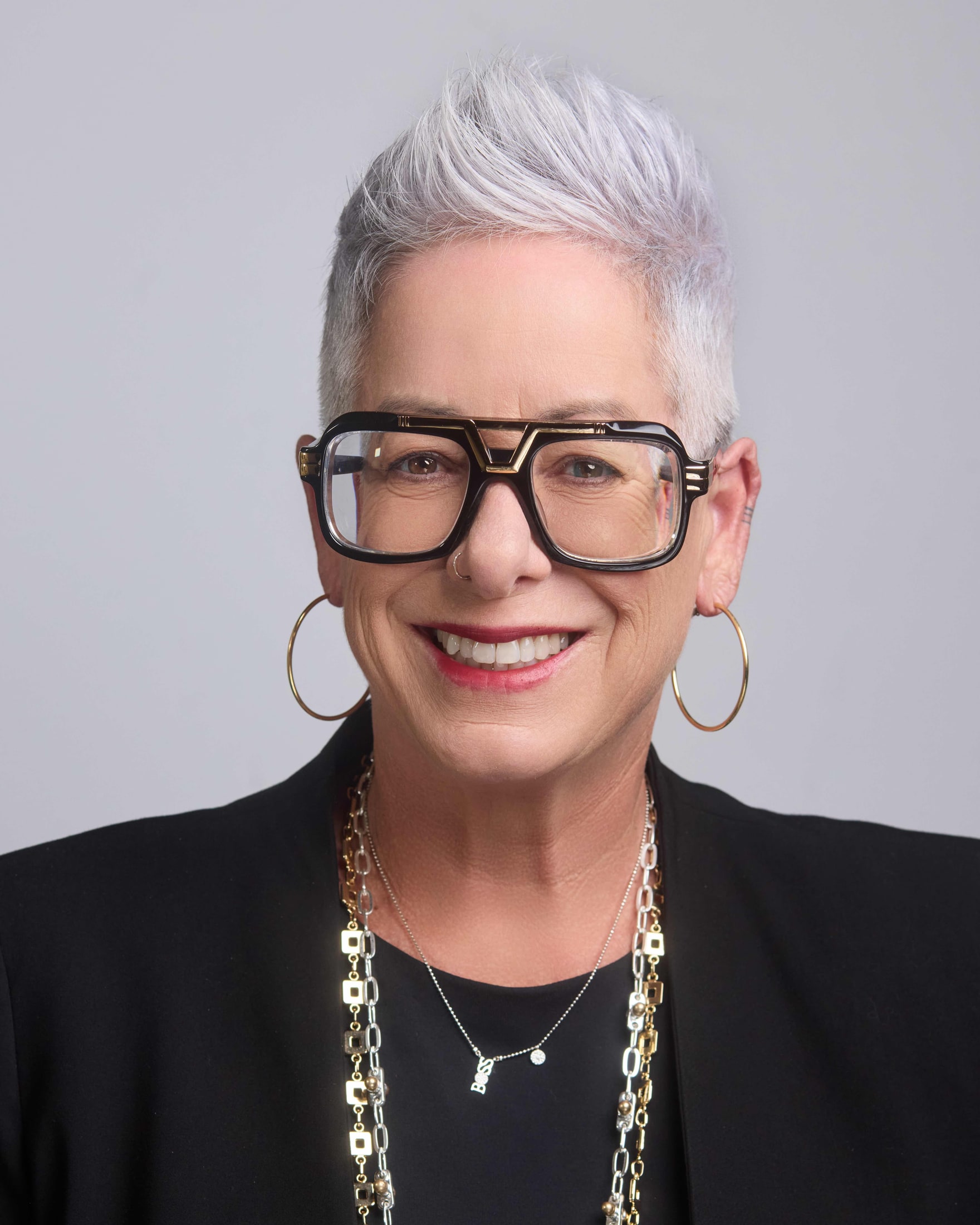 Headshot photographed on the white backdrop I bring to every session