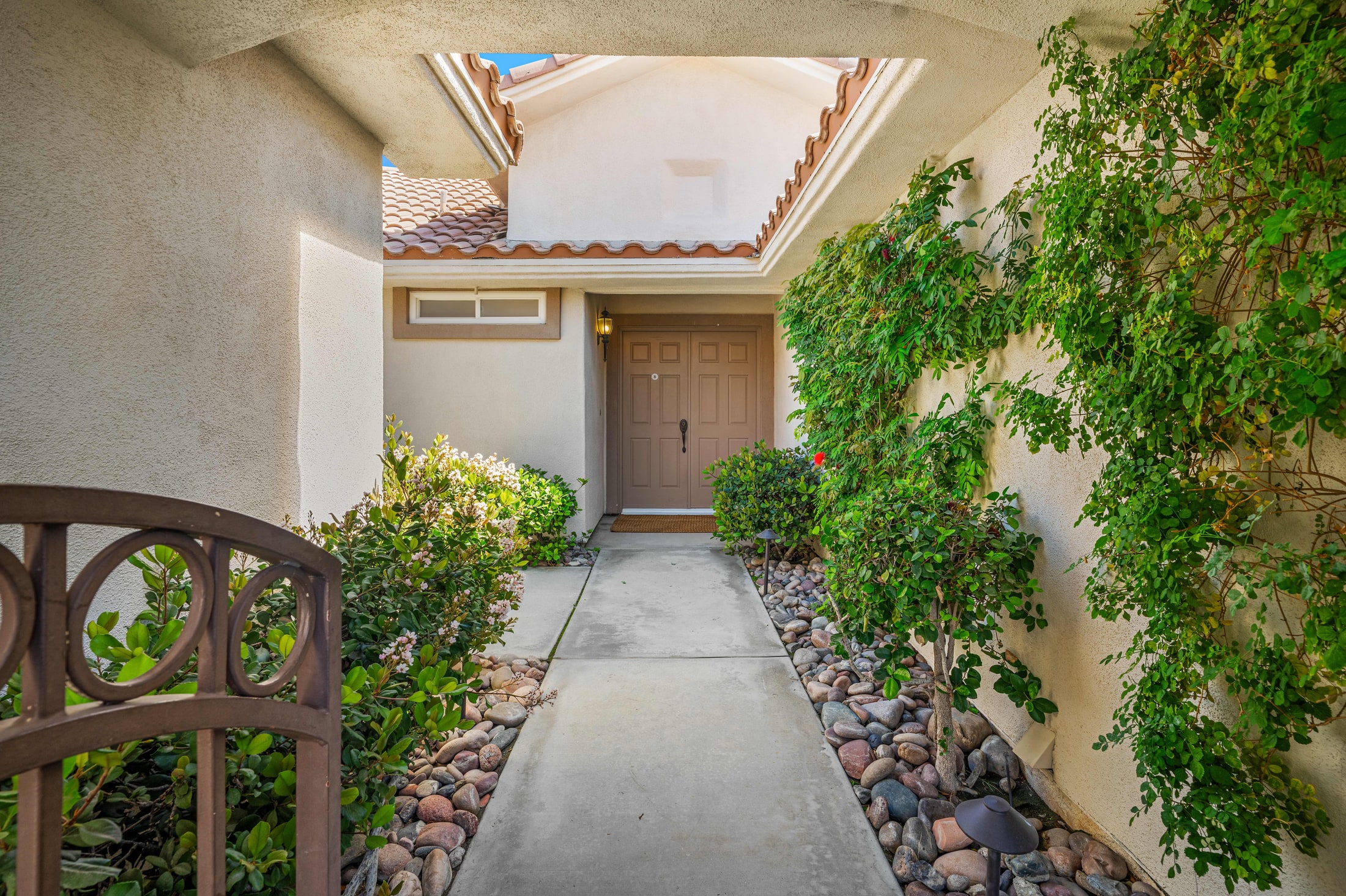 Front entry walkway with desert landscaping