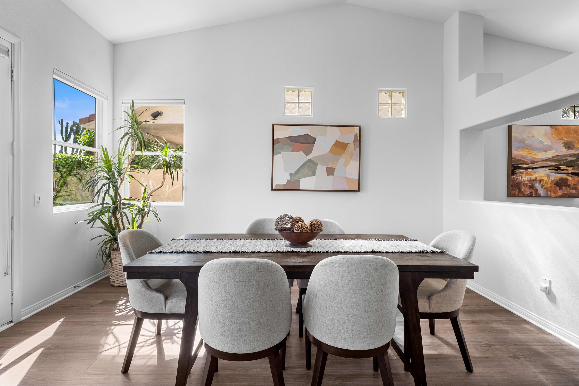Dining room with vaulted ceiling